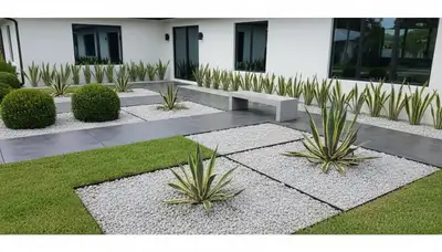 Modern pea gravel landscape with geometric design and architectural plants in Sarasota, FL